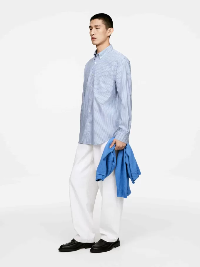 Avslappnad skjorta med knäppning Avslappnad skjorta med knäppning