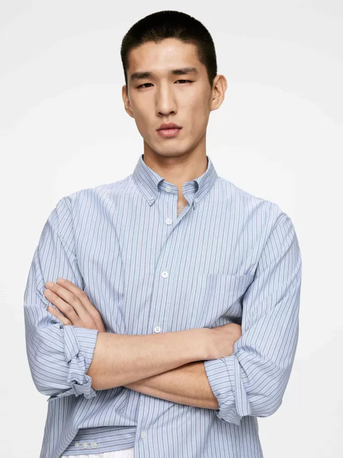 Avslappnad skjorta med knäppning Avslappnad skjorta med knäppning