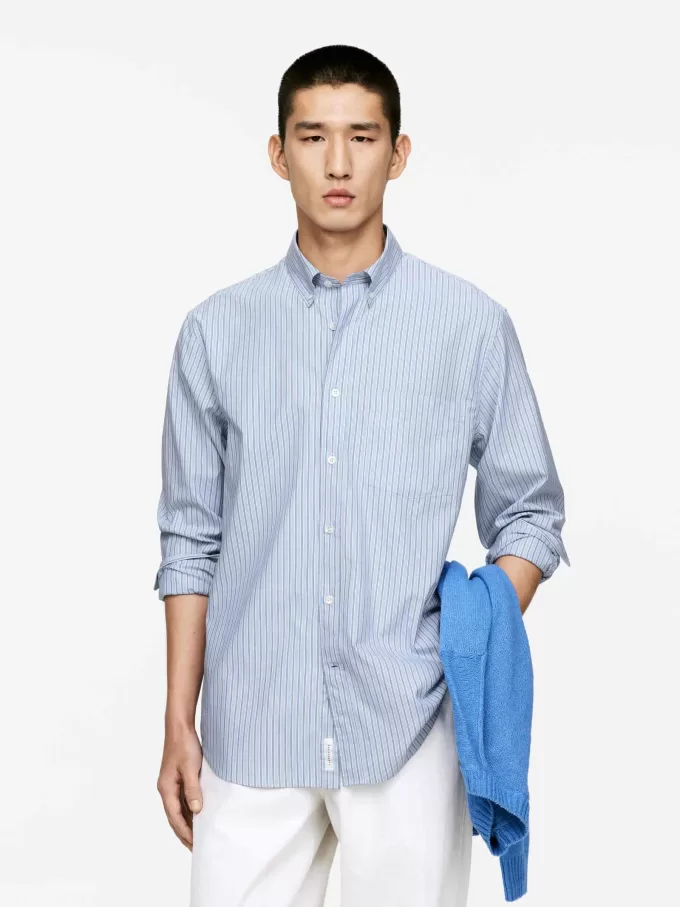 Avslappnad skjorta med knäppning Avslappnad skjorta med knäppning