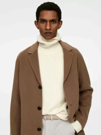 Bälte i flätat läder