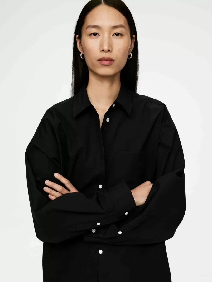 Batwing-ärmad skjorta Batwing-ärmad skjorta