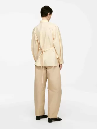 Blus i bomull med knytskärp