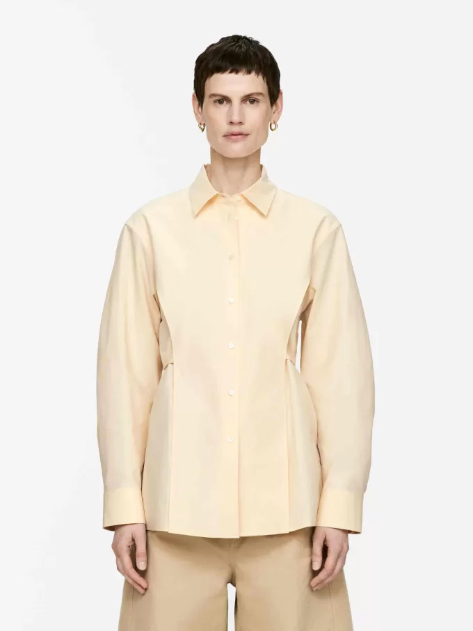 Blus i bomull med knytskärp Blus i bomull med knytskärp