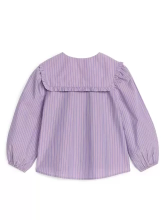 Blus med volangkrage