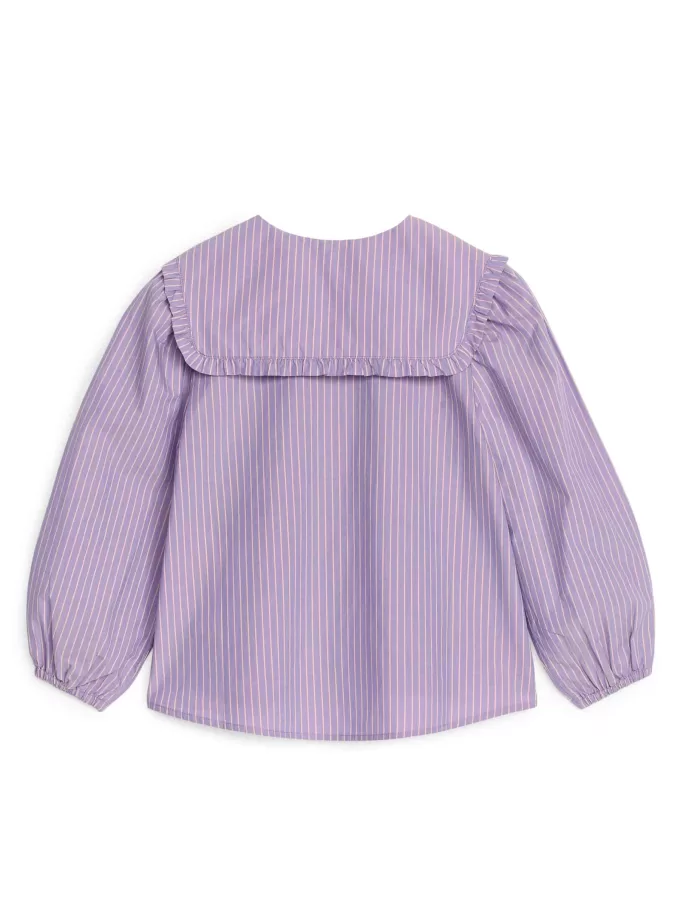 Blus med volangkrage