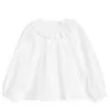 Blus med volangkrage