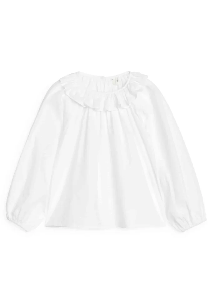 Blus med volangkrage