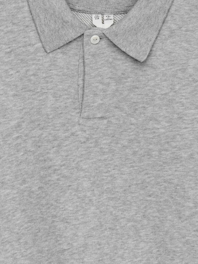 Broderad pikétröja