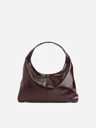 Glänsande läderväska