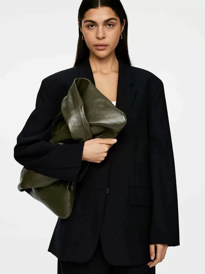 Glänsande läderväska Glänsande läderväska