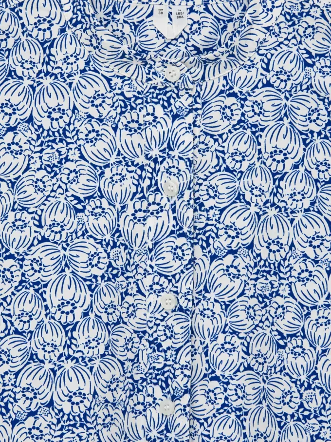 Klänning i bomullstryck Klänning i bomullstryck