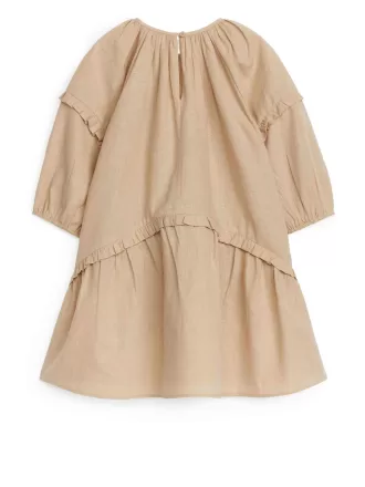 Klänning med volang i linneblandning