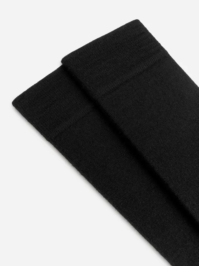 Knähöga ullstrumpor