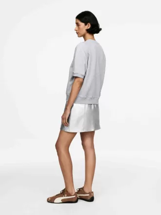 Metallisk läderkjol