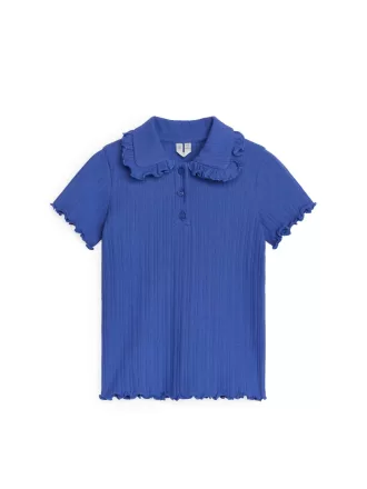 Ribbad jerseytopp med volangkrage