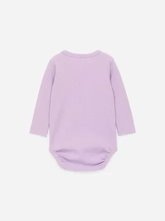 Ribbstickad långärmad body Ribbstickad långärmad body