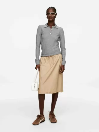 Ribbstickad pikétröja