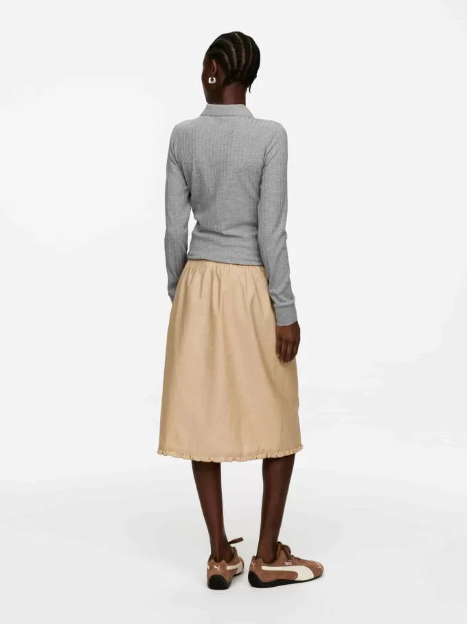 Ribbstickad pikétröja Ribbstickad pikétröja