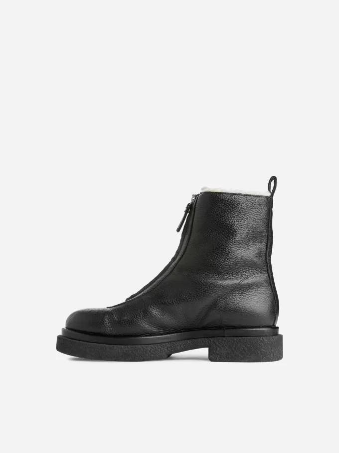 Skinnstövlar i fuskpäls Skinnstövlar i fuskpäls