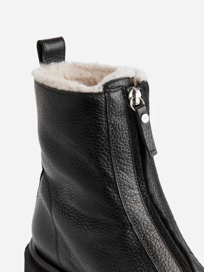 Skinnstövlar i fuskpäls Skinnstövlar i fuskpäls