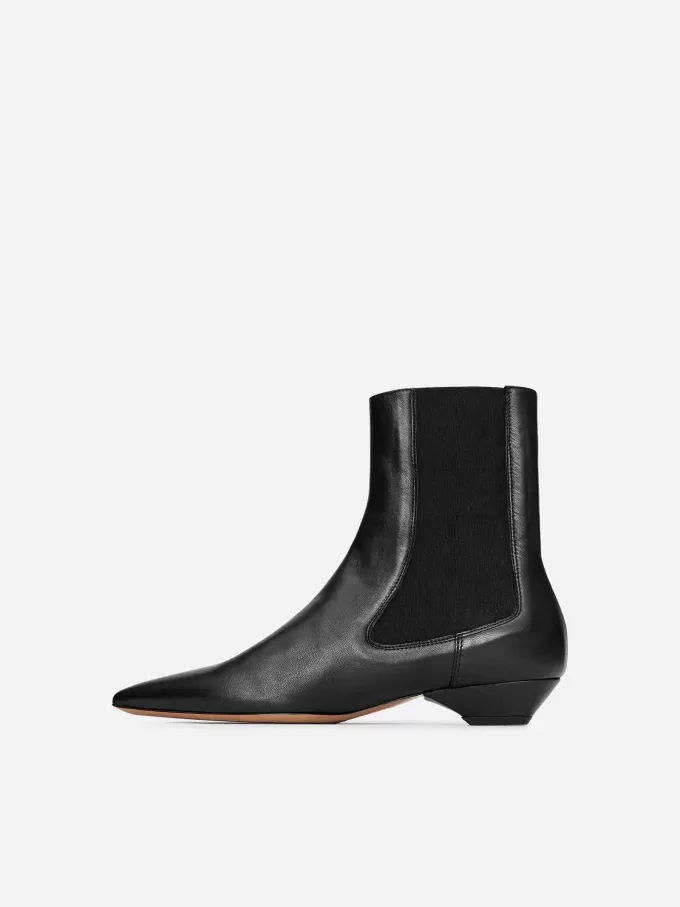 Spetsiga läderkängor Spetsiga läderkängor