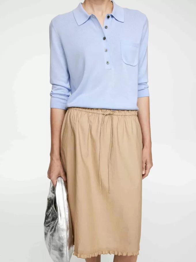 Stickad pikétröja Stickad pikétröja