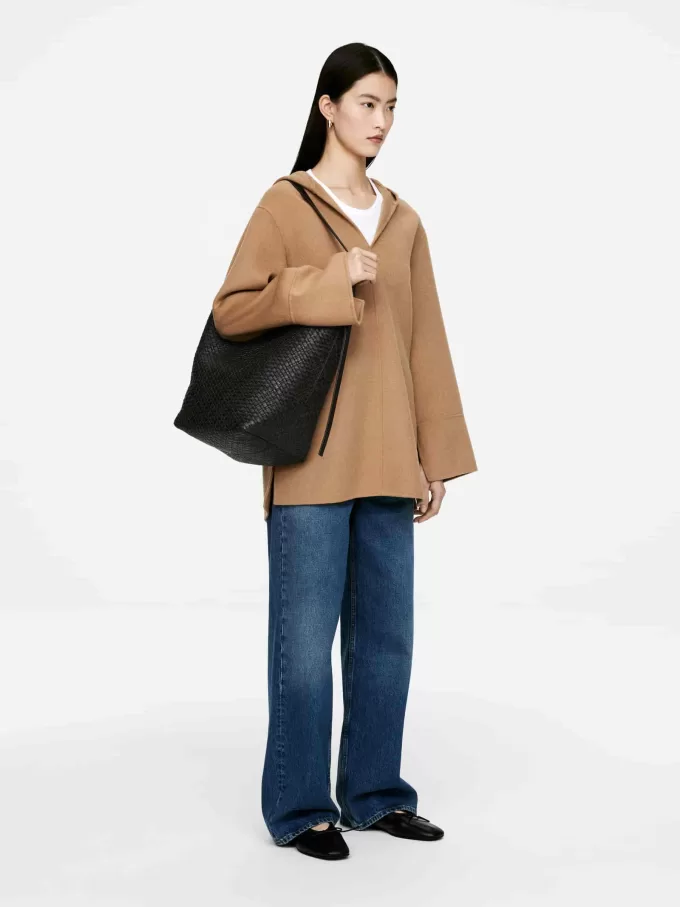 Tygväska i vävt läder Tygväska i vävt läder