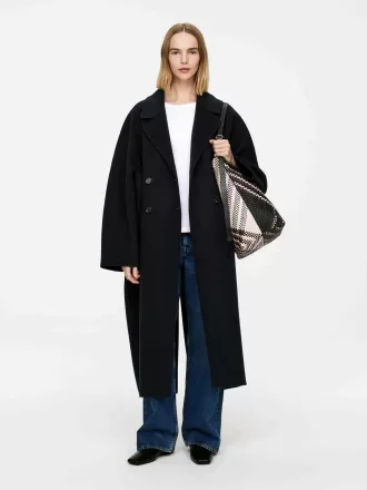 Tygväska i vävt läder