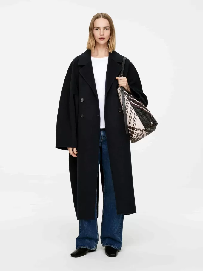 Tygväska i vävt läder