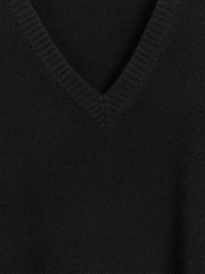 V-ringad ullklänning V-ringad ullklänning