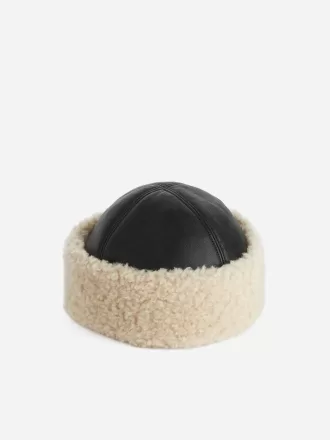 Värmande läderhatt