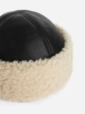 Värmande läderhatt